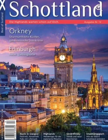 Cover eines Reisemagazins Schottland mit abendlicher Skyline von Edinburgh und beleuchtetem Uhrturm